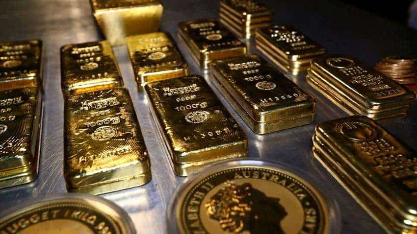 Gold holds in tight range after Powell policy comments Gold holds in tight range after Powell policy comments