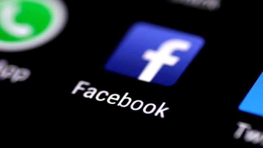 Facebook switches news back on in Australia, signs content deals