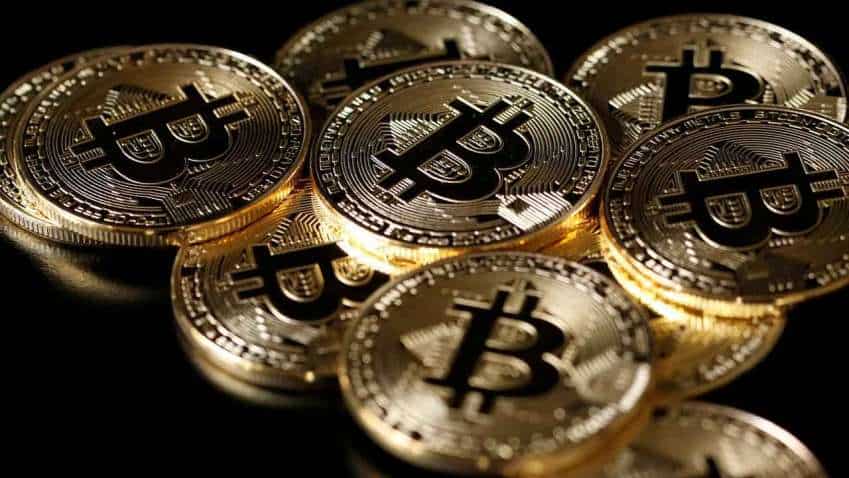 Bitcoin hits record high; trades as high as $59,755 on Saturday