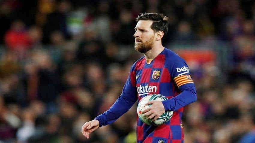 Lionel Messi double leads Barcelona to within four points of La Liga summit