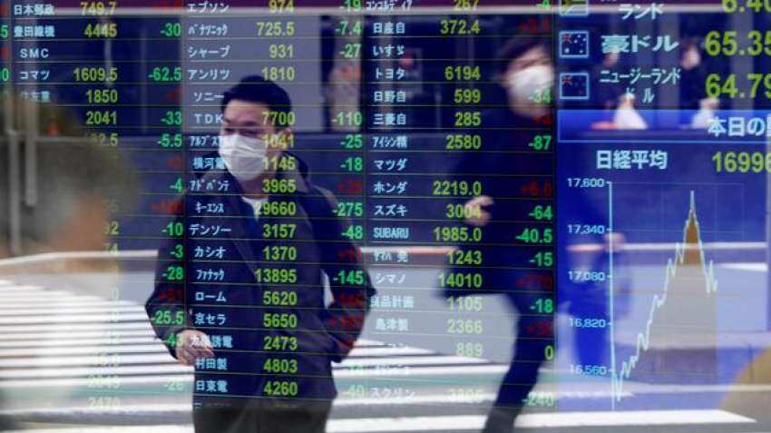 Asian markets fight for footing as investors fret over Evergrande crisis Asian markets fight for footing as investors fret over Evergrande crisis