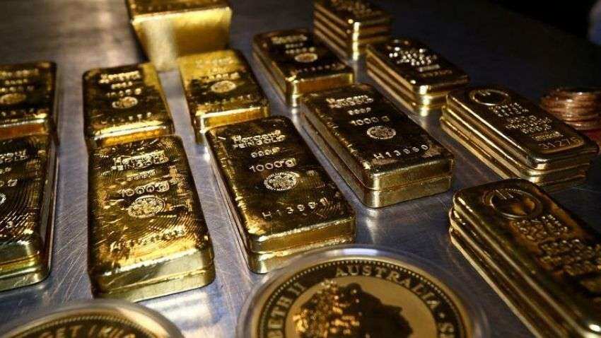 Gold marginally down; silver gains Rs 40 - Check latest rates