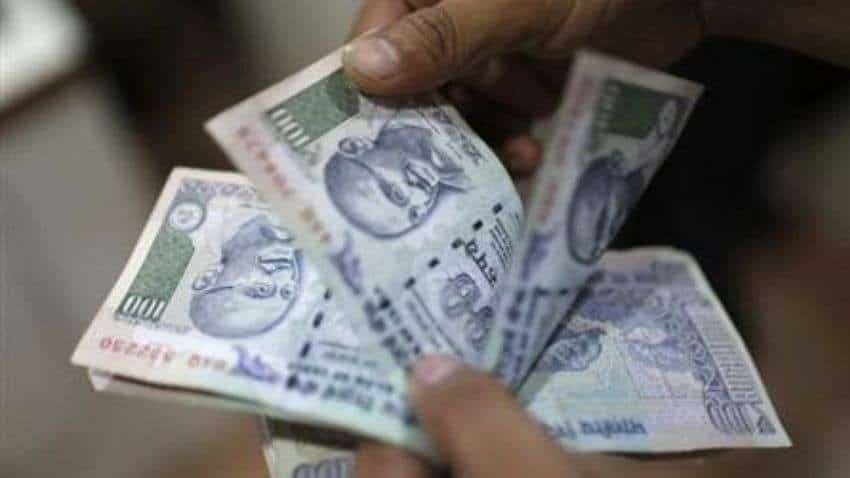 Rupee gains on dollars inflows; traders await auction outcome Rupee gains on dollars inflows; traders await auction outcome