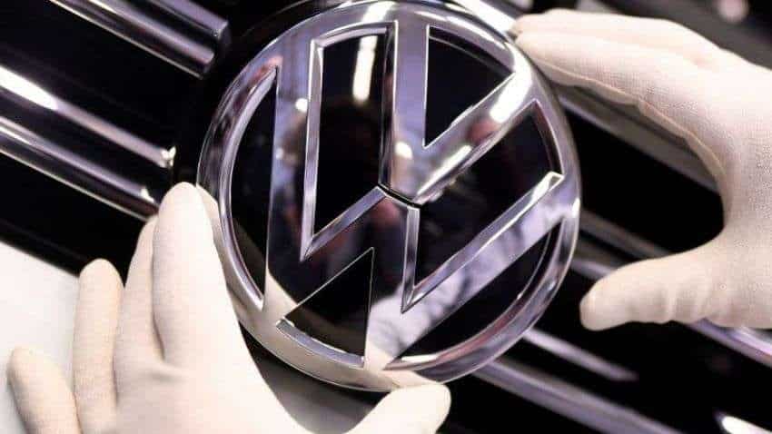 Volkswagen lowers sales outlook as chip shortage hits profit