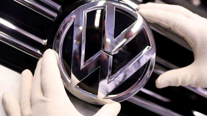 Volkswagen lowers sales outlook as chip shortage hits profit Volkswagen lowers sales outlook as chip shortage hits profit