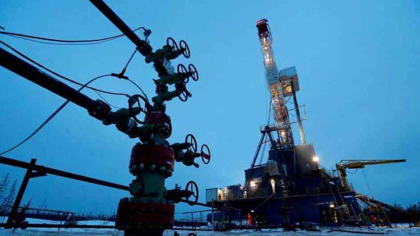 Oil prices stabilise after wild swings on prospect of crude stockpiles release
