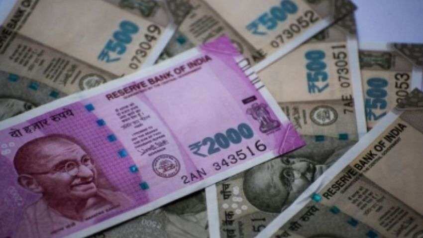 Rupee slumps 12 paise to close at 74.52 against US dollar Rupee slumps 12 paise to close at 74.52 against US dollar