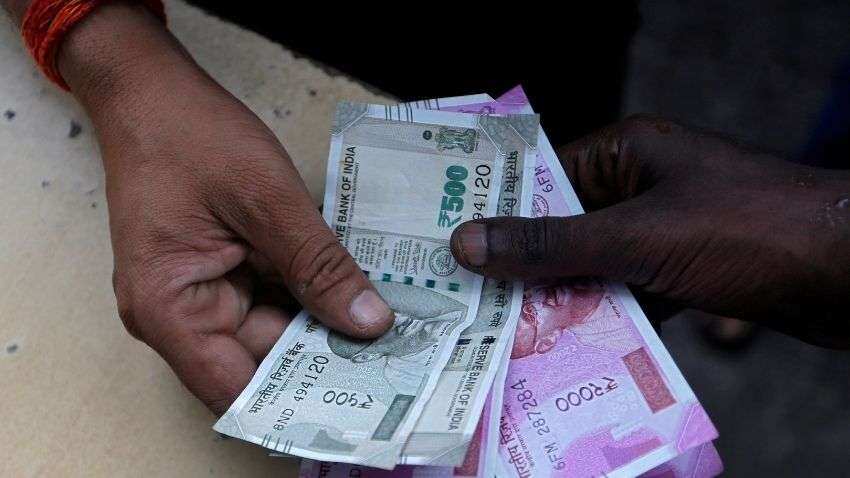 Rupee slips 5 paise against US dollar in early trade