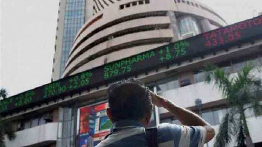 Market Update: Nifty, Sensex trade flat with positive bias after gaining nearly 1 per cent in morning trade; Bajaj twins among top losers 