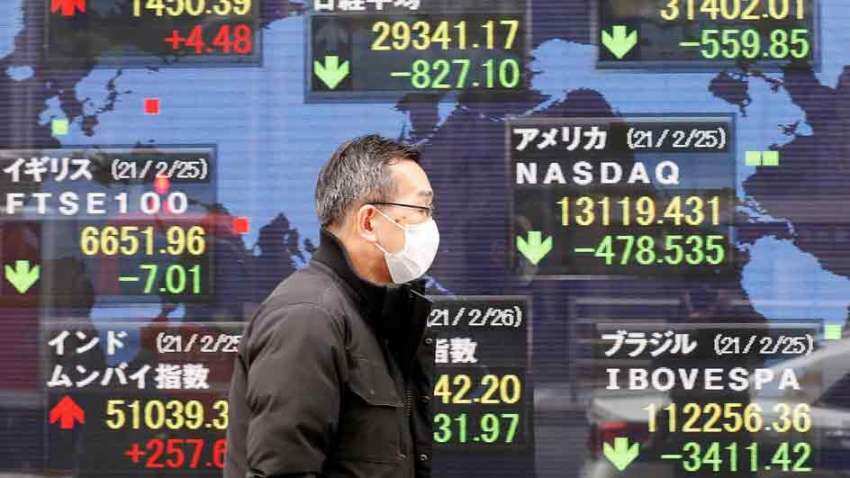 Asian shares rise as China cuts key mortgage rate