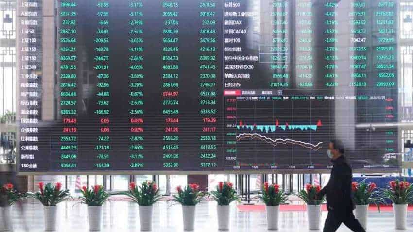 Asian stocks, US futures regain footing after Fed rate shock