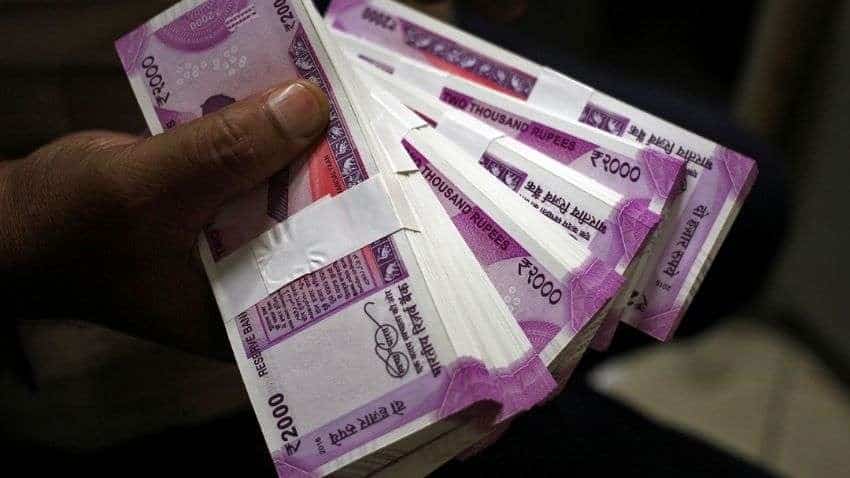 Rupee gains 21 paise to 76.33 against US dollar in early trade