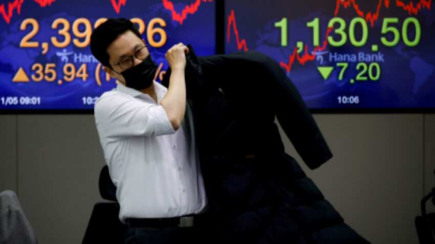 Asian shares tumble as global growth fears mount