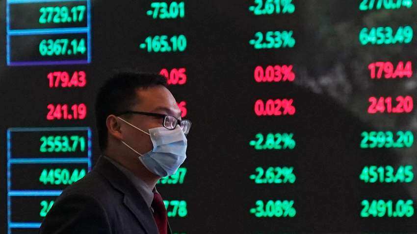 Asian stocks shrug off Wall St weakness but growth concerns remain