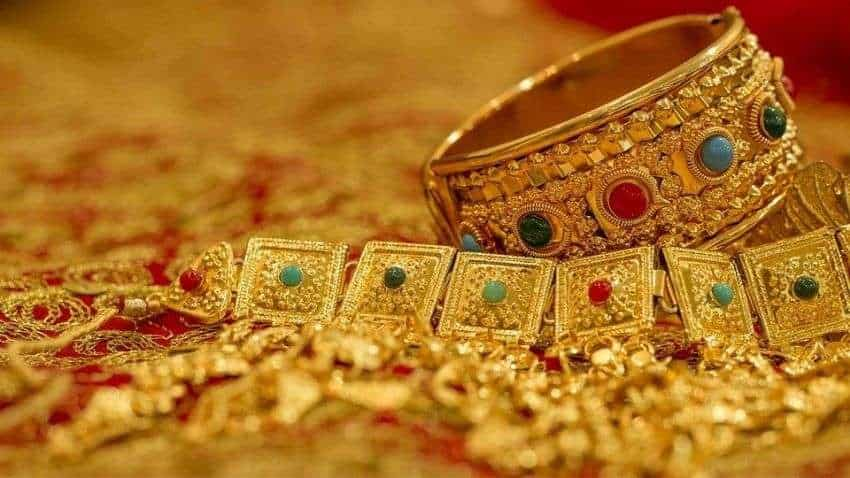 Gold declines Rs 205; silver down by Rs 926