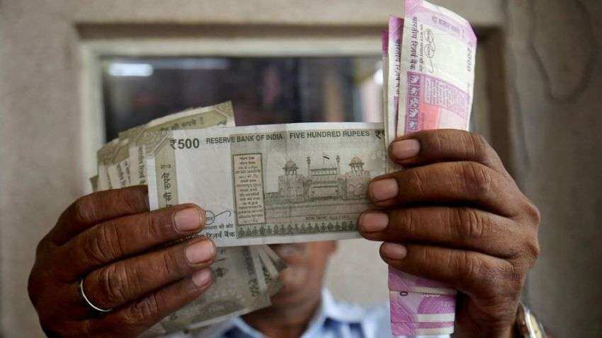 Rupee hits record low on higher global crude prices