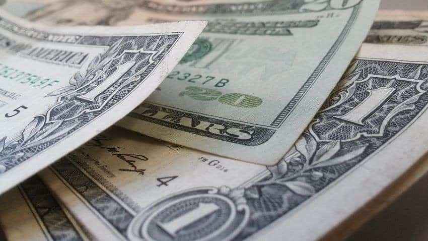 Dollar continues dream run, little stands in its way - Reuters poll