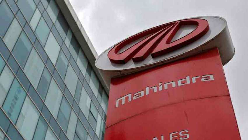 M&amp;M shares jump 5% to fresh high after British International Investment commits Rs 1925 cr for its new EV arm 
