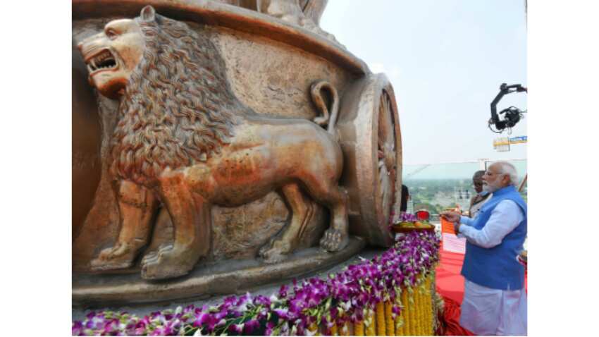 IN PICS: PM Narendra Modi unveils national emblem cast on roof of new Parliament building