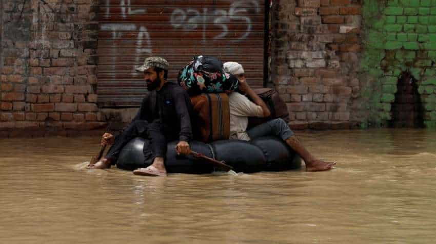 Explainer: How ingredients of warming world combined in vulnerable Pakistan to create unrelenting rain, deadly flooding