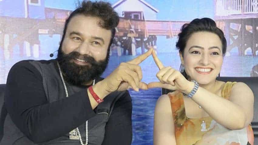 Honeypreet name change, latest news: Dera Sacha Sauda chief Gurmeet Ram Rahim renames his 'daughter' - Ruhani Didi | Honeypreet Insan News | Zee Business Honeypreet name change, latest news: Dera Sacha Sauda chief Gurmeet Ram Rahim renames his 'daughter' - Ruhani Didi | Honeypreet Insan News | Zee Business