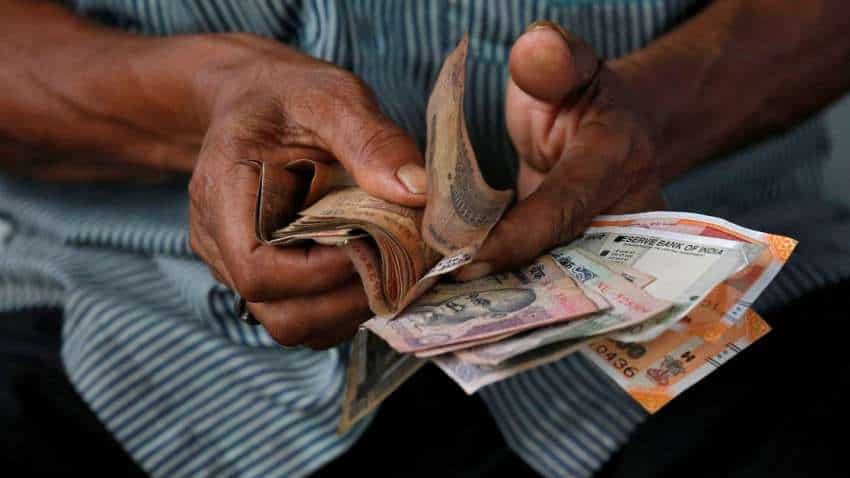 Rupee slips 15 paise to settle at 82.48 against US dollar