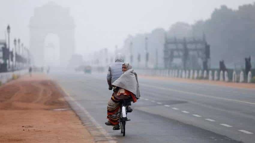 Delhi weather, temperature today: Cold wave sweeps national capital as temperature plunges to 1.4 degrees Celsius, IMD issues orange alert; trains hit 