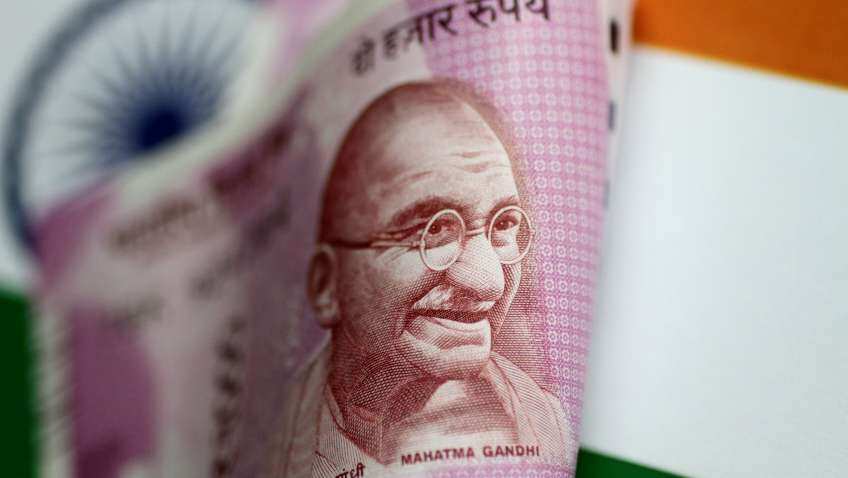 Rupee gains 15 paise to close at 82.68 against the US dollar
