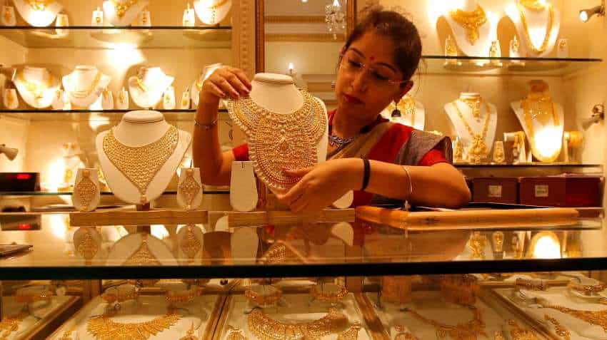 Gold price today, March 13: Yellow metal gains on MCX as dollar slips - Check rates in Delhi, Mumbai and other cities