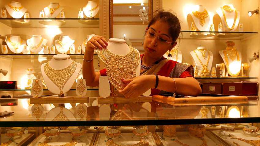 Gold price on Akshaya Tritiya: Precious metals trade under pressure, gold hovers near Rs 60,000 level, should you buy?